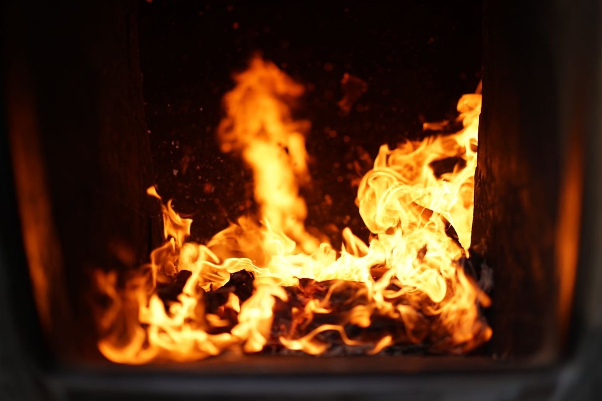 Flames burning inside a gas furnace